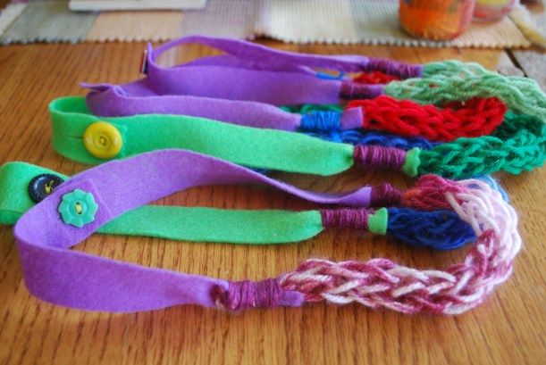 We made necklaces for everyone to put in their bags.  They turned out pretty cute.