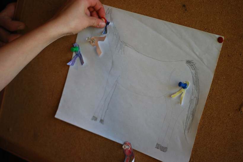 Pin the ribbon on the horse.