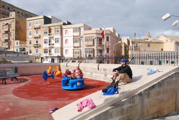 The girls were ready to take a break from walking to play at a playground.