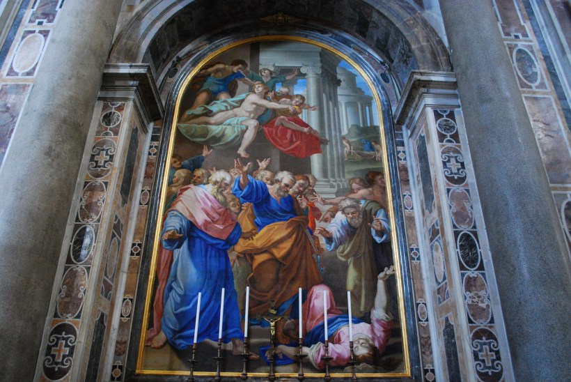 Inside, the church is mostly marble and stone, with many beautiful statues.  There is not much for colorful artwork but the pictures that are there (like this one) are not paintings but rather made of tile so that they will last for as long as the rest of the church.