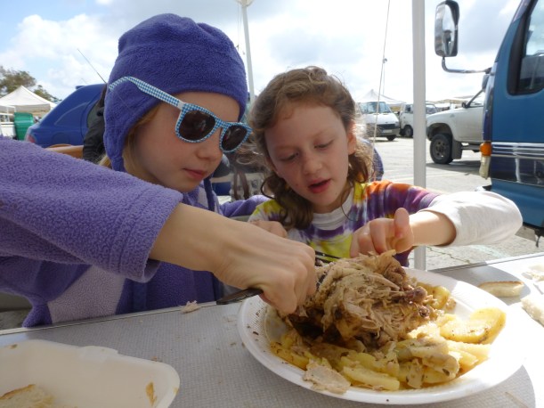We ate lunch at the market at a stand that was selling traditional Maltese food.  The menu was all in Maltese so we just ordered what the person in front of us ordered - rabbit!  Rabbit is a traditional Maltese food but this was the first we had.  It was very tasty.  The girls got a whole chicken and they had a lot of fun digging into it.