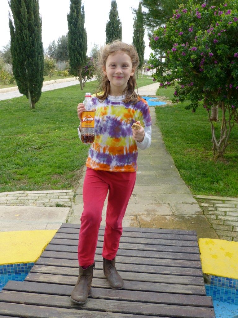 Lily is showing off her Kinnie, a Maltese soda that none of us really like, and her imqaret, a fig filled pastry reminiscent of a fig pop tart - yum!