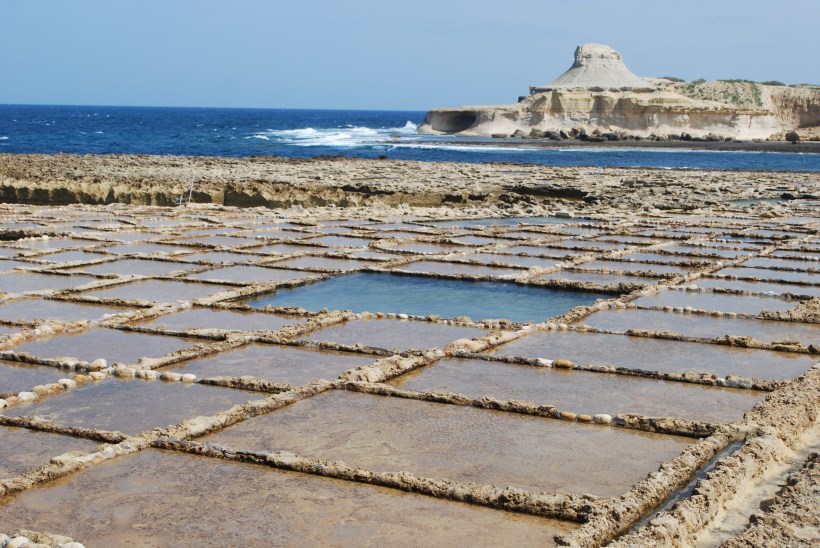 On Sunday, our guide was a student at the University who is a Gozo native (well, technically, he was born in Detroit, but as lived on Gozo since he was 3).  He took us where we requested.  Our first stop, the salt pans.  These squares fill up with saltwater which evaporates.  The salt is then collected and sold as sea salt!