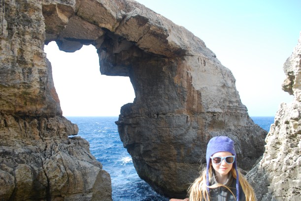 Another natural arch carved out of stone by the forces of wind and water.