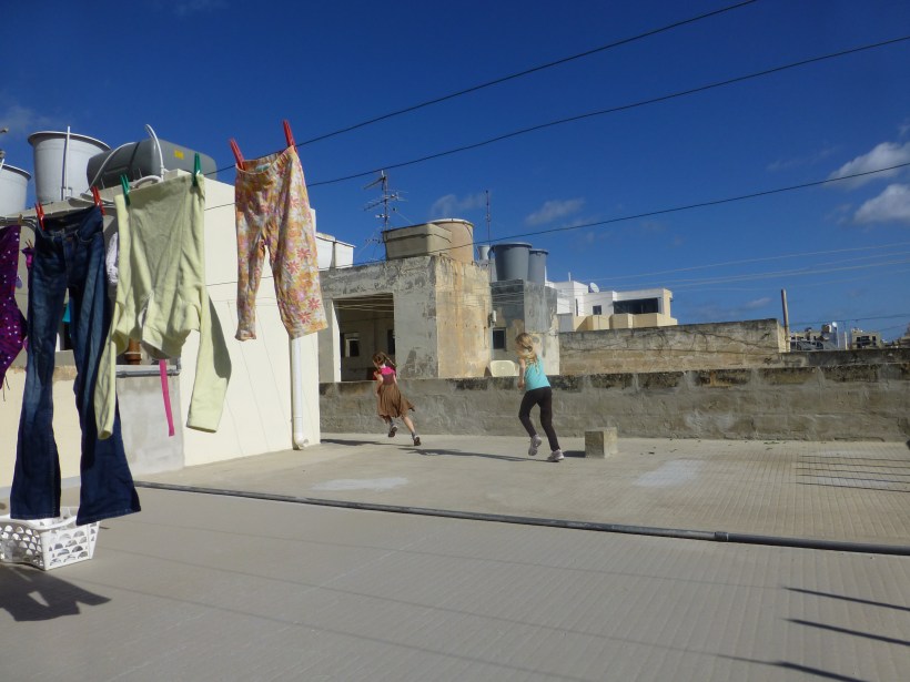 Last but not least, the roof. Where we hang our clothes, read, eat (once in a while) and run around. We love the roof and are happy to only have to walk up one flight of stairs to get there.