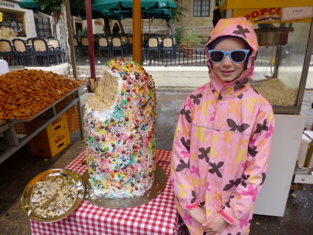 In addition to gorging on meat before Lent, many people devour sweets during Carnival.  There were many stands and this one sold traditional Maltese cake which they sliced off this hunk.  It was more like dry cookie dough with candied citrus and chocolate chips. 