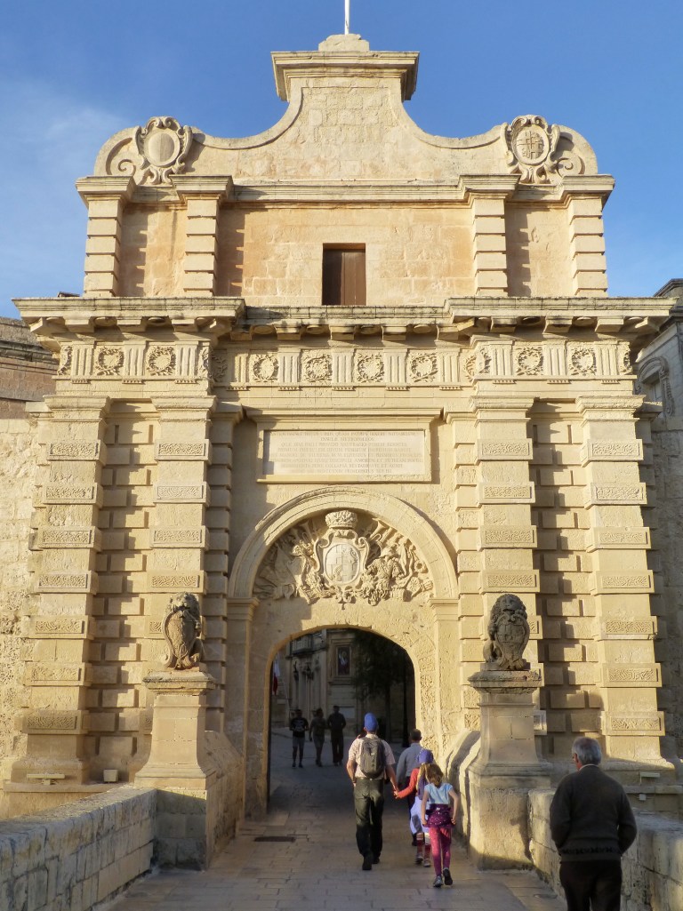 Walking through the front gates. 