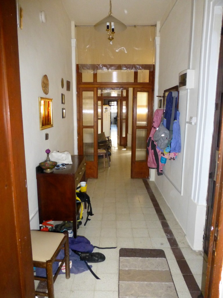 If you turn right, you will see this long hallway (all the way back to our bedroom).