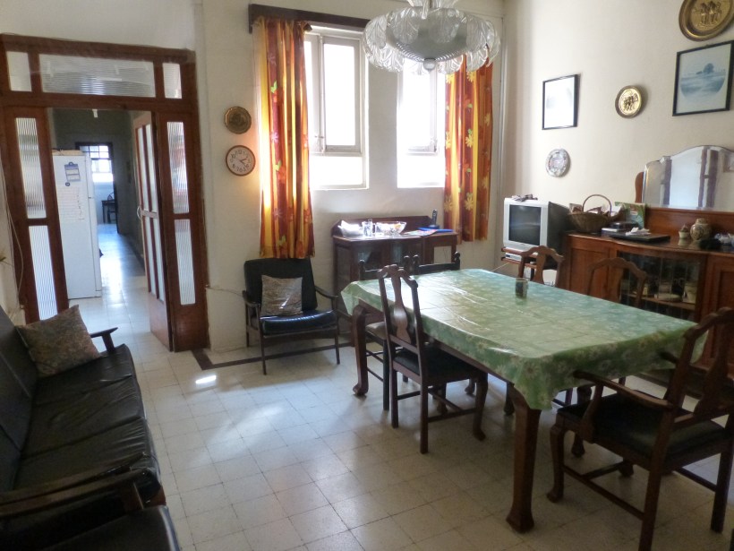 The first stop down the hallway is the dining room. This is also our living room/hangout room.