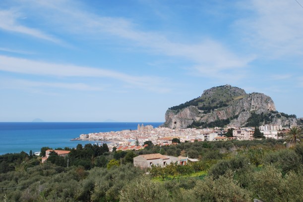 A view of Cefalu (pop. 15, 000) as you approach from the west.  The area was probably first inhabited in the late 5th century BC. The names comes from the Greek word 'Kefaloidion' which translates to 'head' - the Greeks thought the rock looked like a giant head.