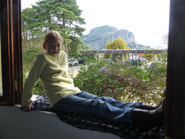 We left so early on Saturday that even with our 30 minute flight and 2 hour drive to hotel, we still arrived in time for breakfast!  We took time to relax a bit in our room before going out to explore.  We stayed in a lovely hotel with beautiful ground and a great view of La Rocca, behind Sylvia.