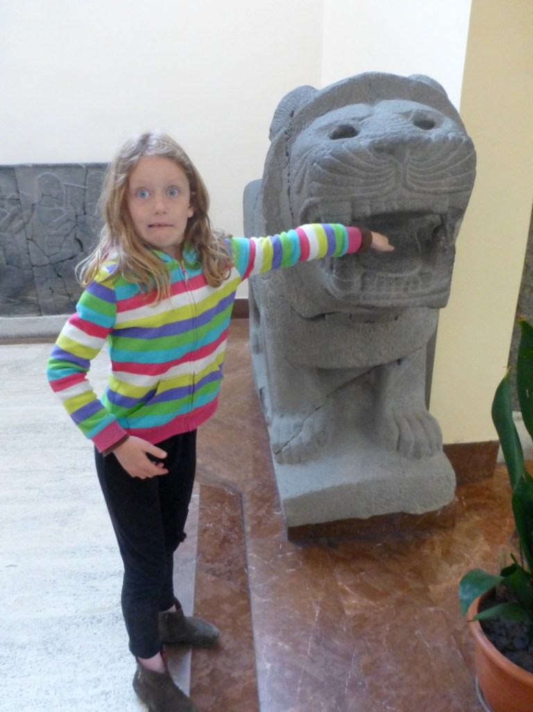After lunch, we toured the Archaeology Museums. And Lily kept getting into trouble...