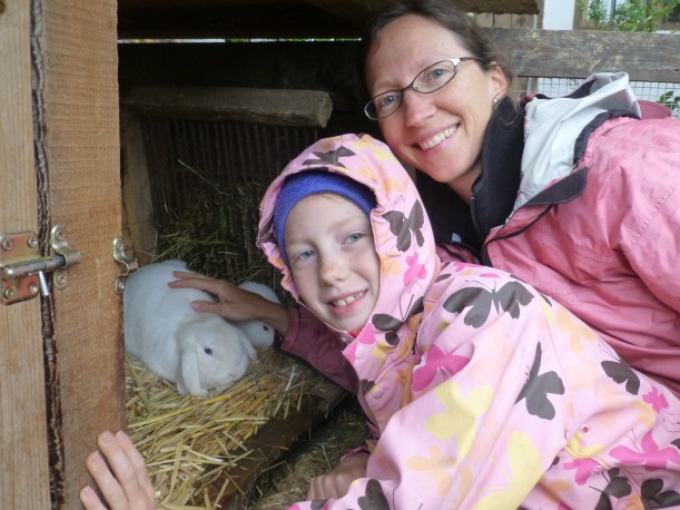 Krebishof is a working farm.  They milk about 15 cows and have about twice as many out in pasture.  The father/son duo also have some 14,000 apple trees and several hundred grape vines.  The mom/daughter-in-law duo run the guesthouse.  Oh - and they have adorable little bunnies!  :)