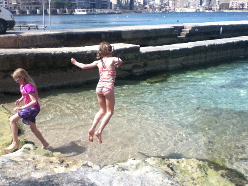 Near the sand is a dock and rocks, both of which provide good jumping spots.  Lily is jumping into Deep Pool, the name we have given this deeper, sandy area.