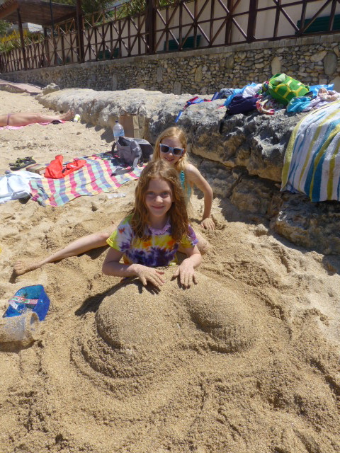 Making sand sculptures at Sliema beach.  We sometimes eat picnic lunches down here, too.