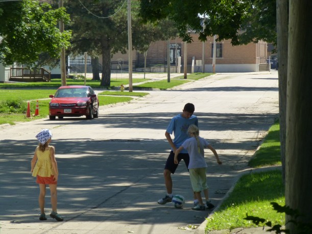 Playing with the cousins.  In the street, no less.  What big girls!
