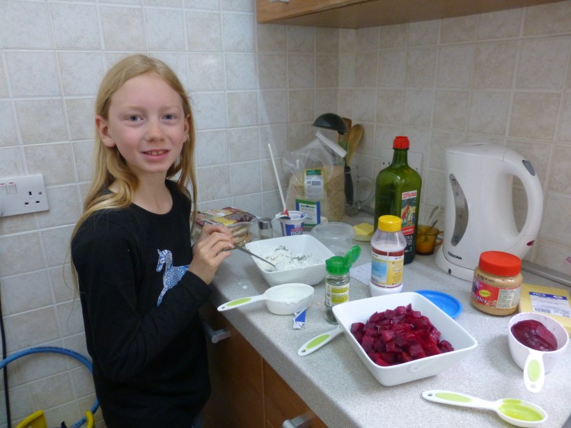 Sylvia making beet salad in our kitchen.  It was small but very functional.
