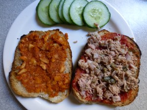 A couple toppings I made: on the left is a tomato paste (kunserva) garlic mixture using crackers as a base.  On the right is tuna mixed with olive oil, red onion and capers.  My favorite!
