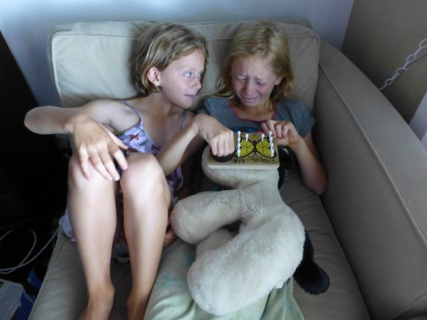 We have fun playing games inside, too.  This year the girls loved playing the butterfly peg game where you try to get rid of all the pegs but one.
