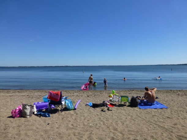 It was really windy during our stay, but on our last full day, we found a beach that was out of the wind.  We spent that afternoon at the water hanging out on our floaties.  