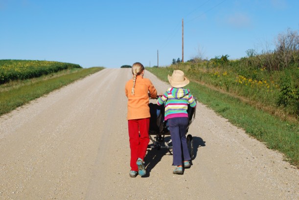 Most mornings start with a morning walk down our road to the next set of mailboxes.  sometimes babies come with us.