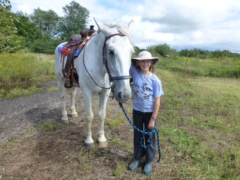 At the end of the day, we got to go on a little trail ride ourselves. Sylvia rode this gentle giant, Rambo.