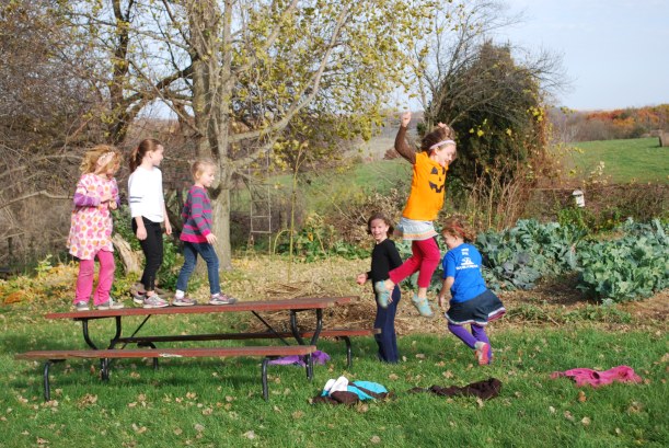 Jumping off the picnic table was not in the game book, provided lots of entertainment! 