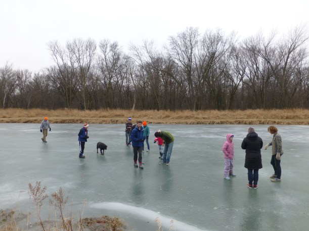 The girls and Jon played daily ice hockey games. This was the first day at the pond - making sure it was frozen enough!