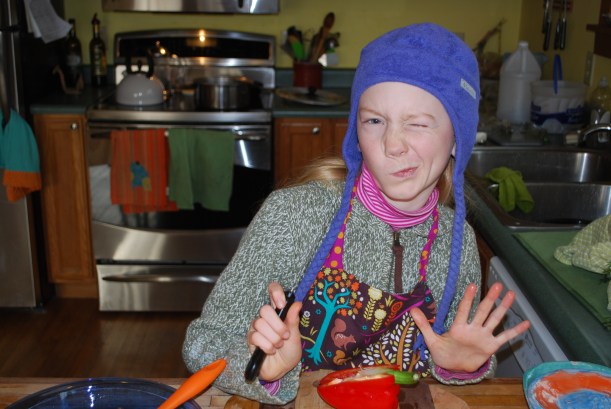 Sylvia cutting veggies.
