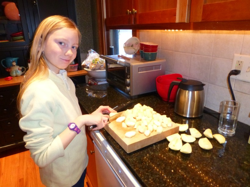 We made lots of baby food for Aliyah.  Sylvia's cutting up apples for applesauce.