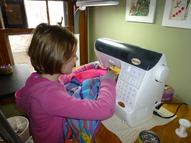 Both girls worked with Grandma to sew swim bags.  It was fun to think about summer, the pool and swimming!