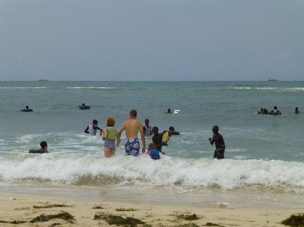 The girls loved playing in the waves with Jon (and with life jackets!).