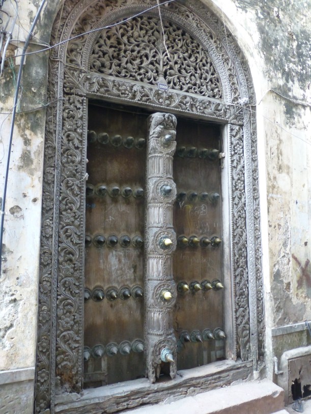 Most of the doors in Stone Town were old wooden ones like this. They were very ornately carved and had spikes on them to keep the elephants away! No need to worry now, though, there are no elephants left on the island.