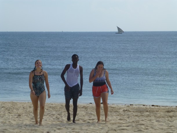 Some of our students were teaching one of the Tanzanian students how to swim.