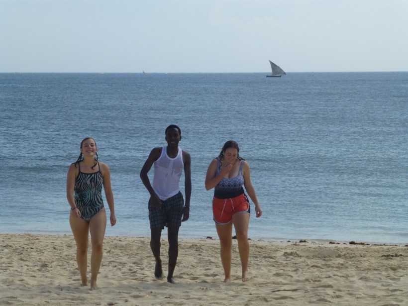 Some of our students were teaching one of the Tanzanian students how to swim.