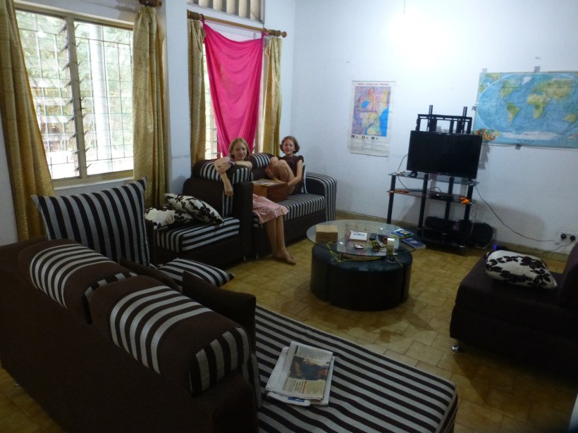 This is a picture of our living room with us in it. One thing we like about our living room is the memory foam couches because we don`t sink into them.