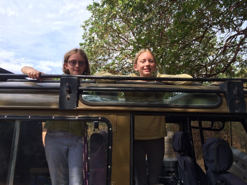 Getting ready for the game drive! We were able to stand on the seats while we were driving which was super fun!