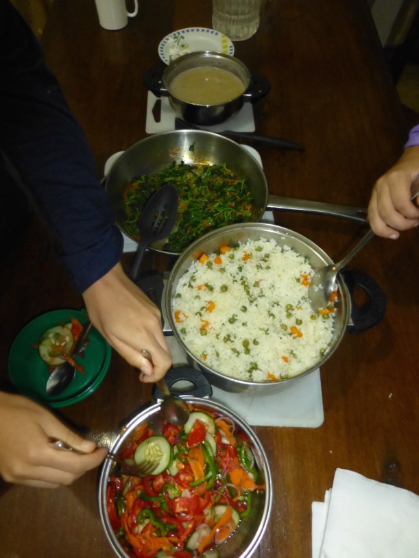 I love the Tanzanian food: kachumbali, wali, mchicha, na mbazee. (Salad, rice, cooked greens and beans).