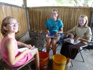 Cleaning the bones back at camp.